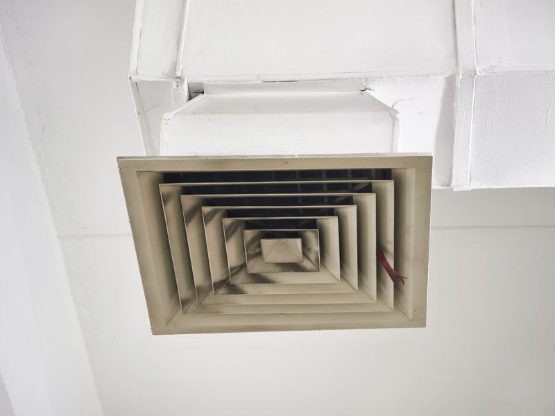 A ceiling register due for attention